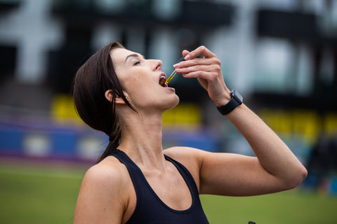 woman using cbd oil