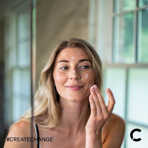 woman using cbd retinol skincare moisturiser