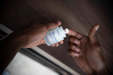 A person using Mission C Relief CBD Cream